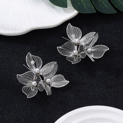Pastoral Flower Earrings In Gold Featuring Metal Petal Design For Elegant Style
