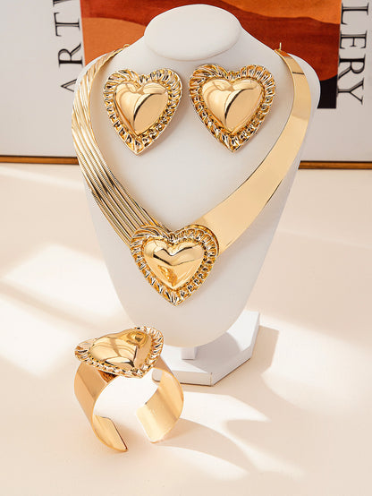 Golden Jewelry Set Featuring Heart Shape Pattern Made Of Metal