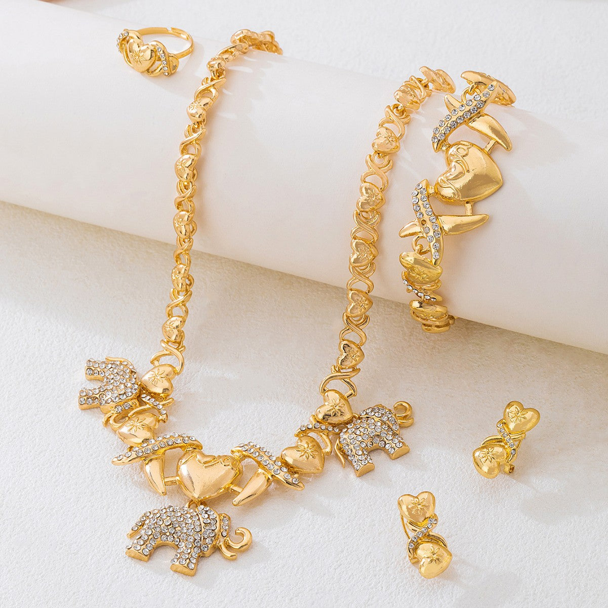 Elegant Golden Jewelry Set Featuring Timeless Design For Special Occasions