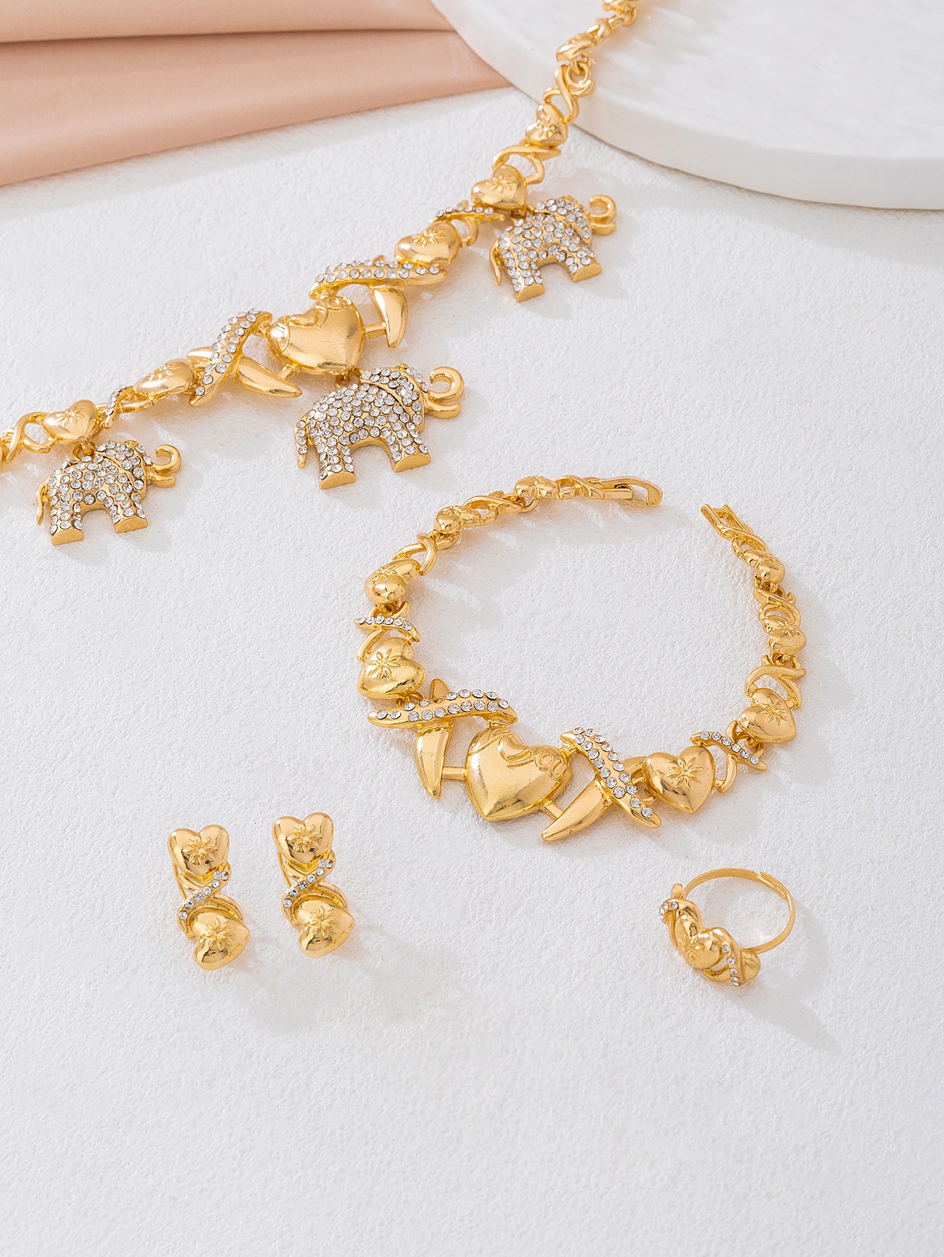 Elegant Golden Jewelry Set Featuring Timeless Design For Special Occasions
