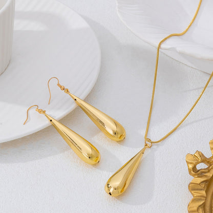 Golden Jewelry Set Featuring Elegant Water Droplets Pattern