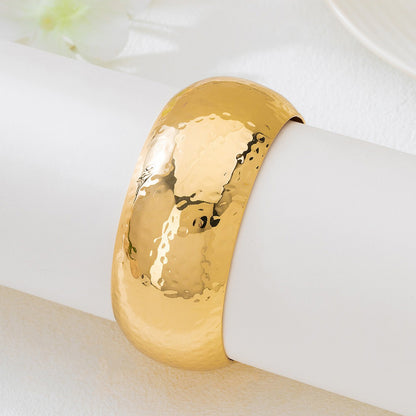 Gold Bangle Featuring Hammered Craftsmanship, Perfect For Elegant Jewelry Accessories