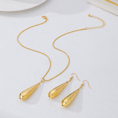 Golden Jewelry Set Featuring Elegant Water Droplets Pattern
