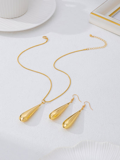 Golden Jewelry Set Featuring Elegant Water Droplets Pattern