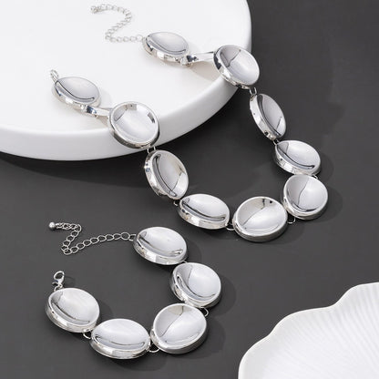 Golden Jewelry Set Featuring An Irregular Pattern Necklace, Elegant And Unique Design
