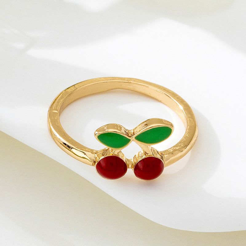Gold Cherry Ring With Enamel Finish, Elegant Design For Stylish Wear