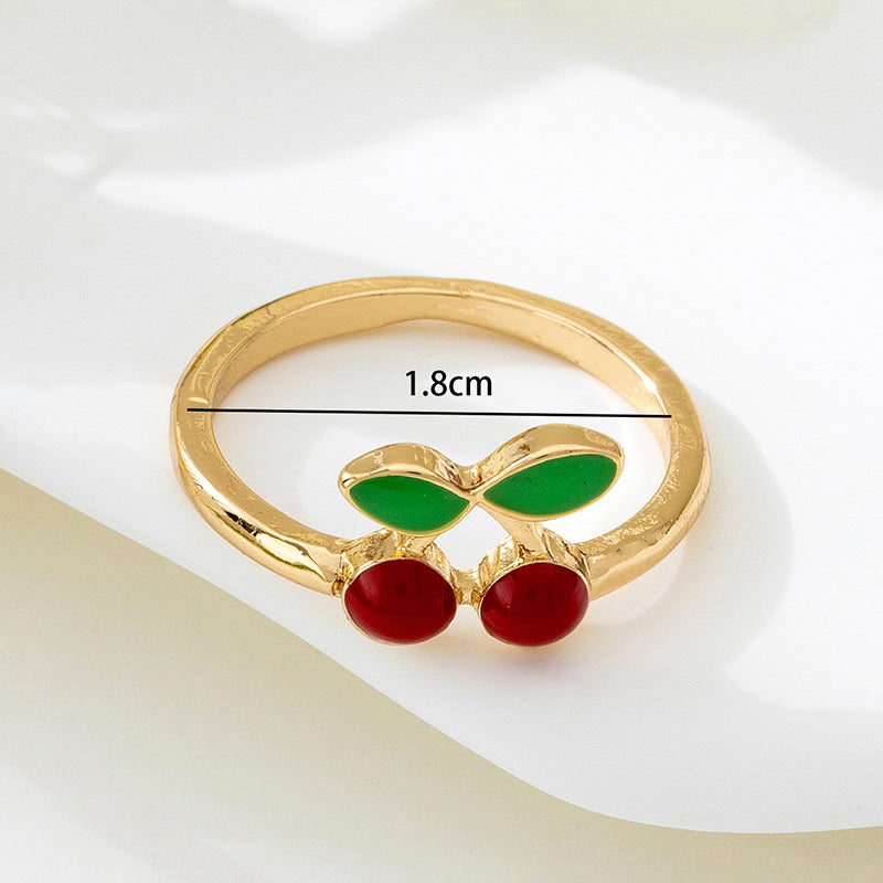 Gold Cherry Ring With Enamel Finish, Elegant Design For Stylish Wear