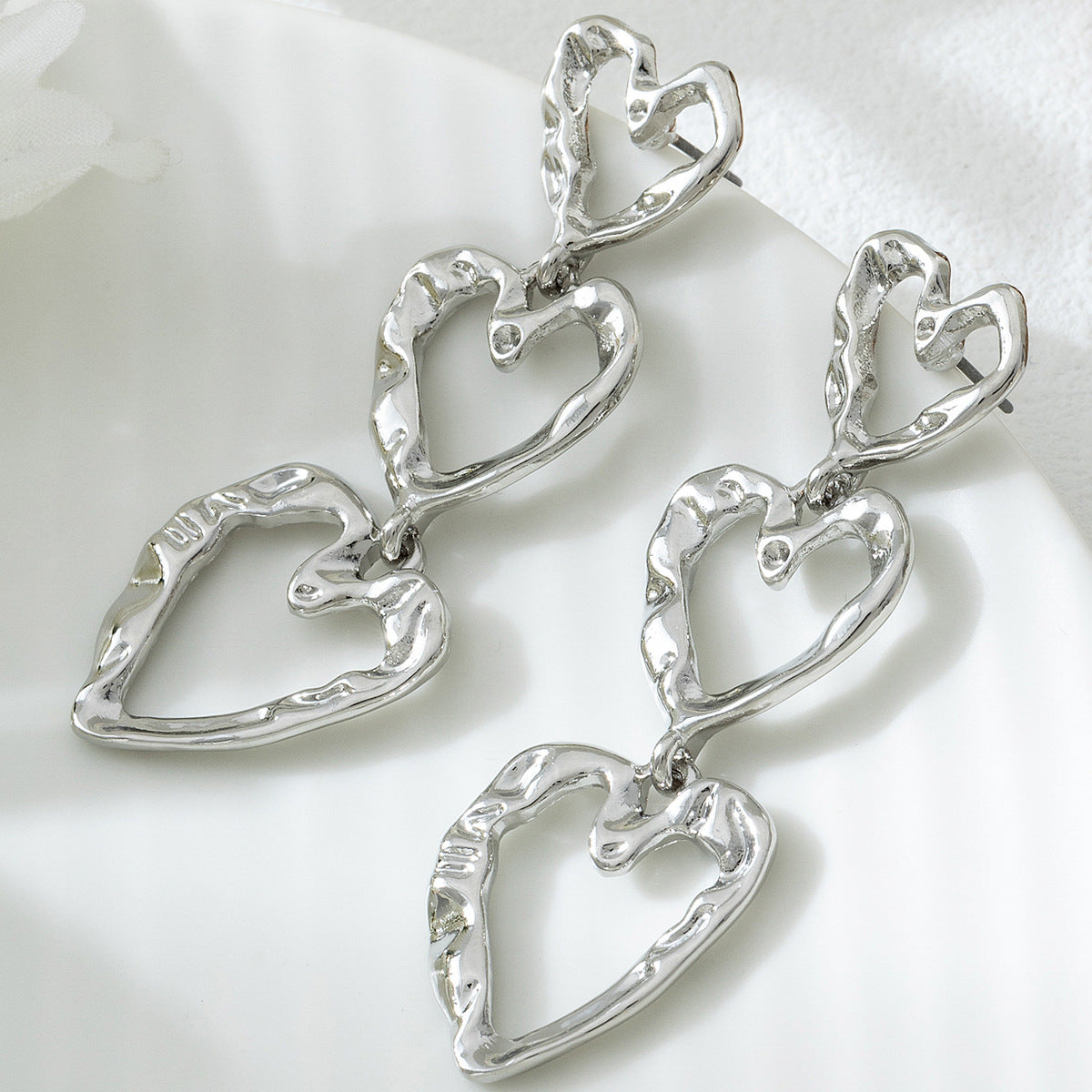 For Women Golden Heart-Shaped Stud Earrings Featuring Electroplated Finish, Fashion Commuter Style From Qingdao, Spring