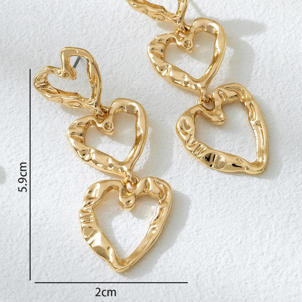 For Women Golden Heart-Shaped Stud Earrings Featuring Electroplated Finish, Fashion Commuter Style From Qingdao, Spring