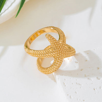 Gold Starfish Ring For Ocean Animal Lovers Featuring Elegant Design