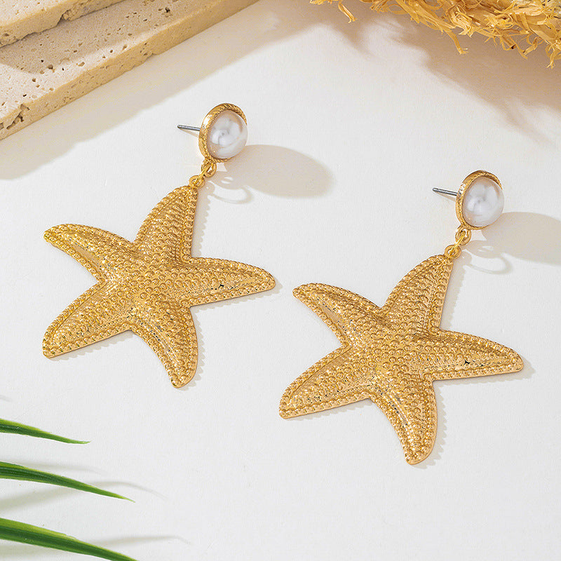 Gold Conch Stud Earrings For Women Featuring A Geometric Starfish Design