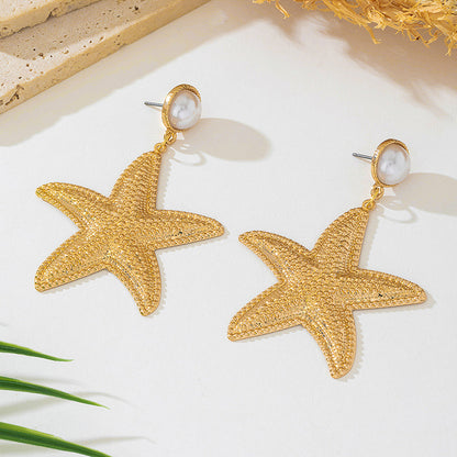 Gold Conch Stud Earrings For Women Featuring A Geometric Starfish Design