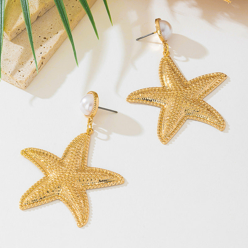 Gold Conch Stud Earrings For Women Featuring A Geometric Starfish Design