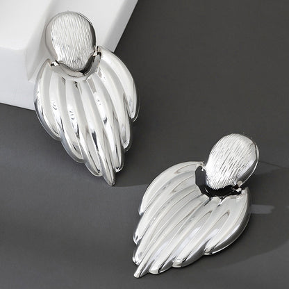 Feather Drop Earrings In Gold Featuring Tassel And Geometric Design For Elegant Style