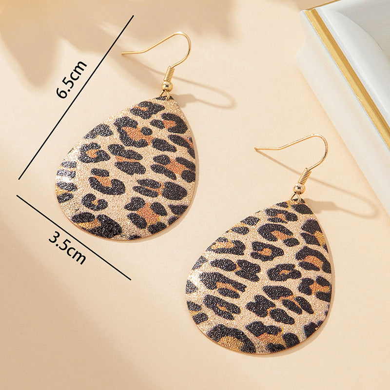 Exaggerated Water Droplets Drop Earrings In Gold For Unisex Wear