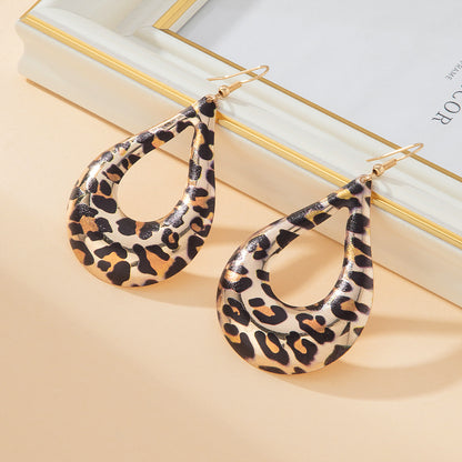 Exaggerated Water Droplets Drop Earrings In Gold For Unisex Wear