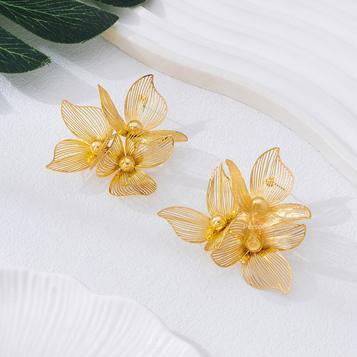 Pastoral Flower Earrings In Gold Featuring Metal Petal Design For Elegant Style