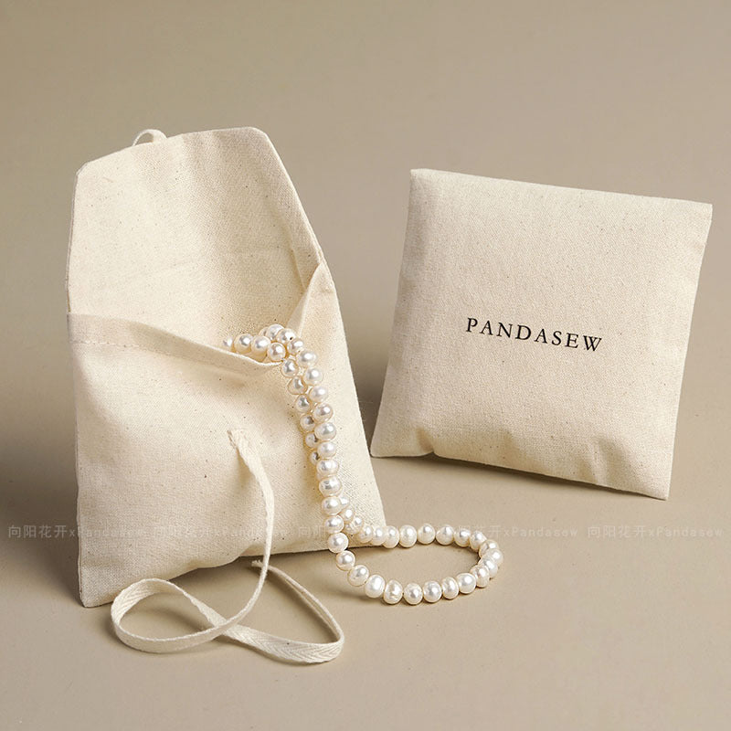 Cotton Jewelry Packaging Bags In Beige For Elegant And Eco-Friendly Jewelry Storage