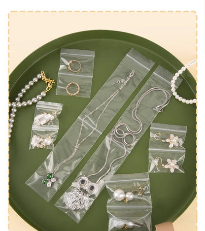 100 PCS Transparent Plastic Jewelry Packaging Bags With Resealable Closure For Secure Storage