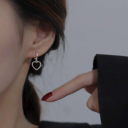 Heart Hoops Earrings In White Featuring Elegant Heart Shape Design For Stylish Wear