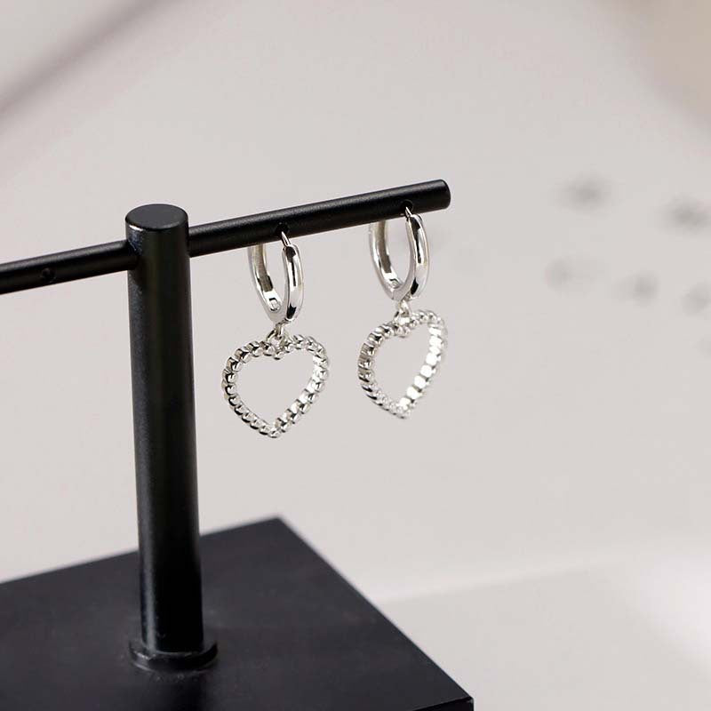Heart Hoops Earrings In White Featuring Elegant Heart Shape Design For Stylish Wear