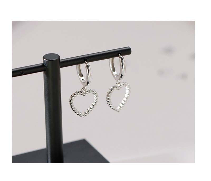 Heart Hoops Earrings In White Featuring Elegant Heart Shape Design For Stylish Wear