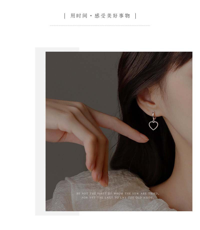 Heart Hoops Earrings In White Featuring Elegant Heart Shape Design For Stylish Wear