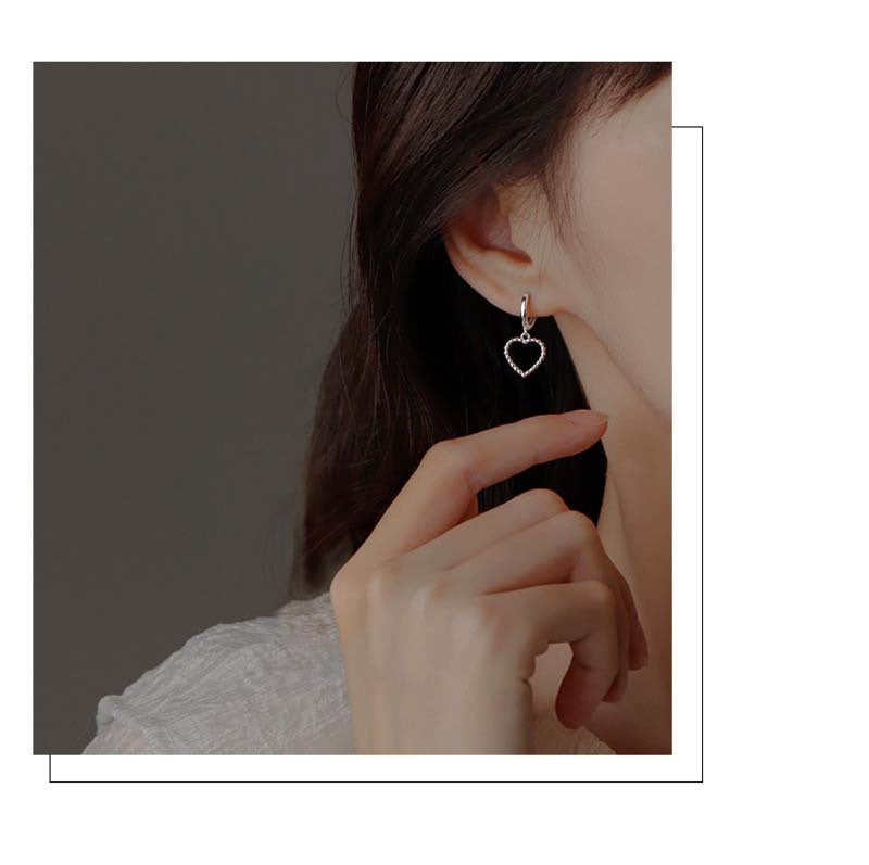 Heart Hoops Earrings In White Featuring Elegant Heart Shape Design For Stylish Wear