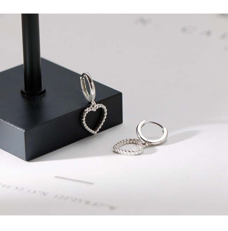 Heart Hoops Earrings In White Featuring Elegant Heart Shape Design For Stylish Wear