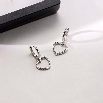 Heart Hoops Earrings In White Featuring Elegant Heart Shape Design For Stylish Wear