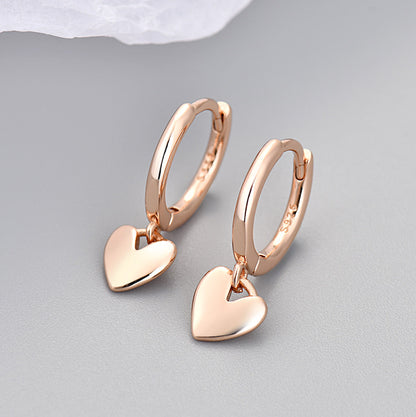 Heart Hoops Earrings In Rose Gold Featuring Elegant Heart Shape Design