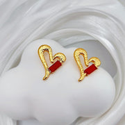Gold stud earrings