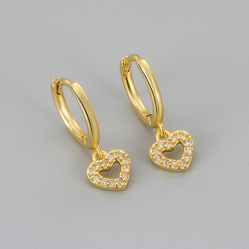 Heart Hoops Earrings For Women Featuring Heart Shape Design In Copper Material With New Style And Golden Tassel Accents