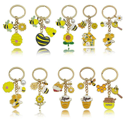 Bee Honeycomb Pendant Featuring A Detailed Bee Pattern In Durable Alloy, Available In Yellow