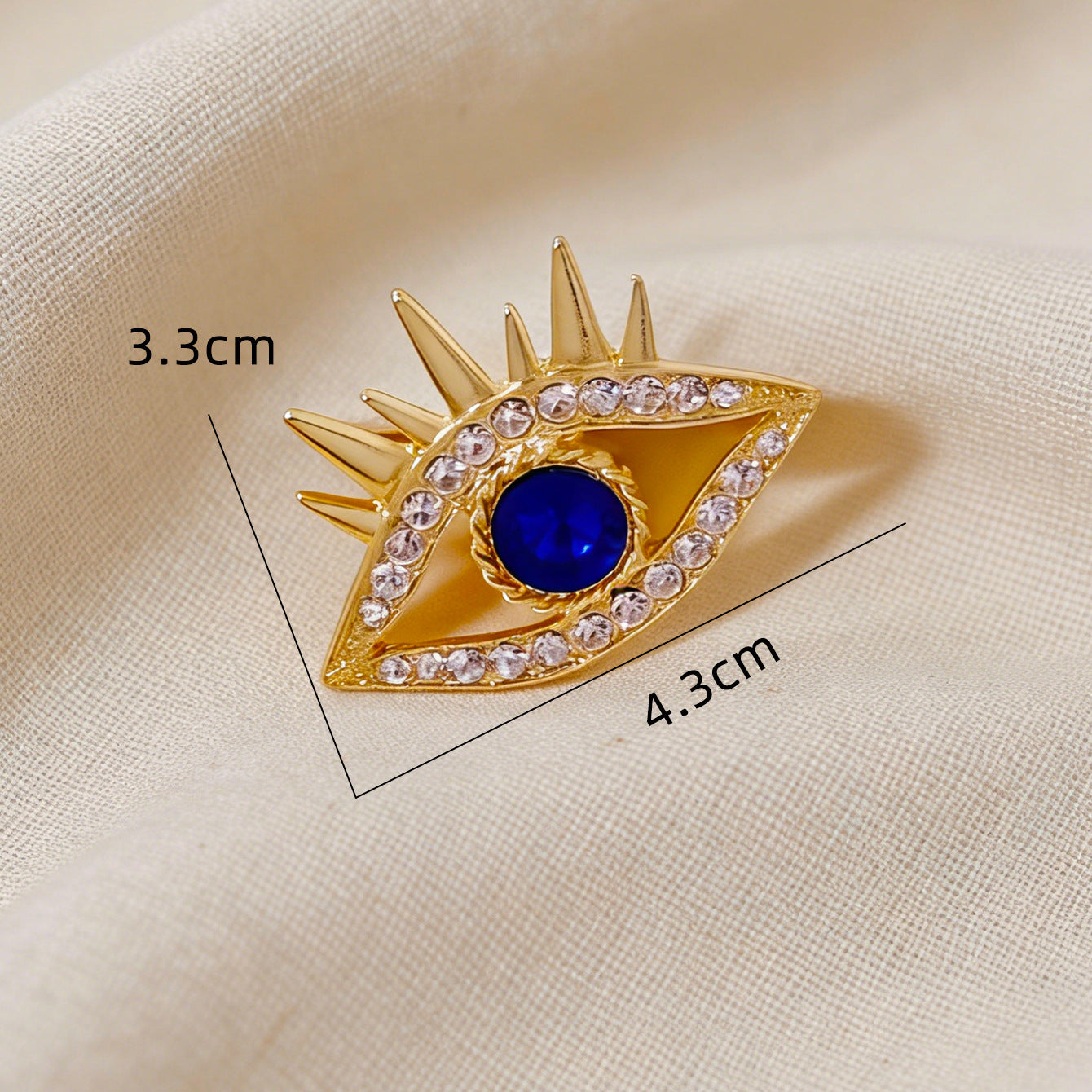 Devil's Eye Pin In Alloy Featuring Zircon Inlay