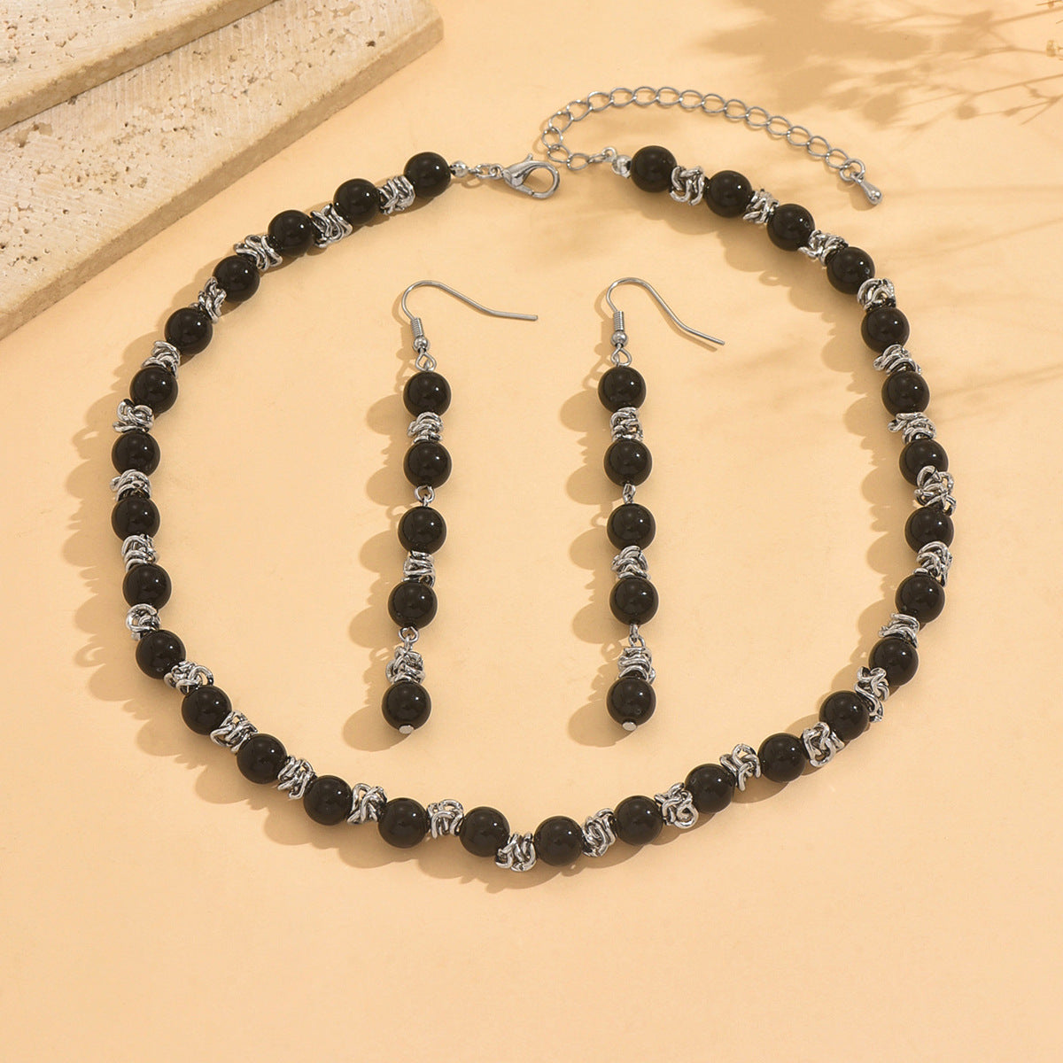Black Jewelry Set Featuring Round Pattern Made With Durable Acrylic Material