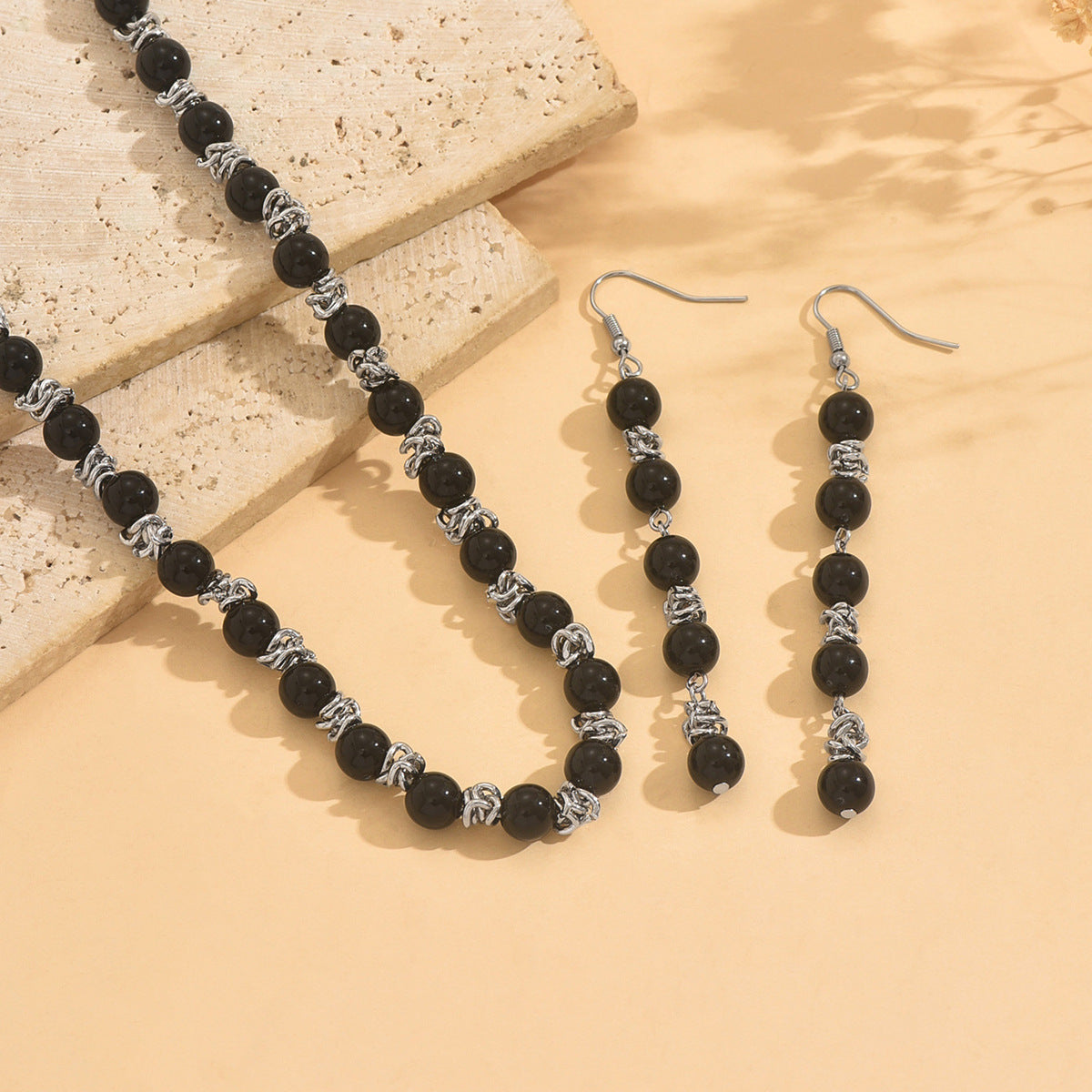 Black Jewelry Set Featuring Round Pattern Made With Durable Acrylic Material
