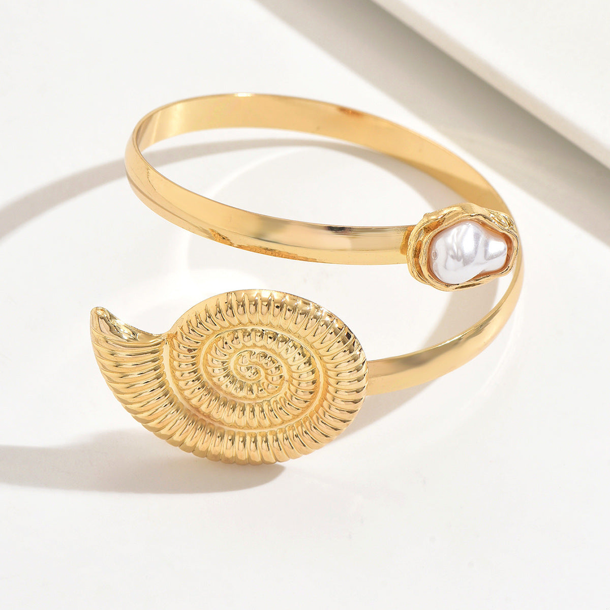 Conch Arm Cuff For Women In Marine Style Featuring Golden Metal Design