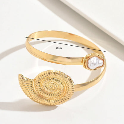Conch Arm Cuff For Women In Marine Style Featuring Golden Metal Design