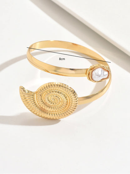 Conch Arm Cuff For Women In Marine Style Featuring Golden Metal Design