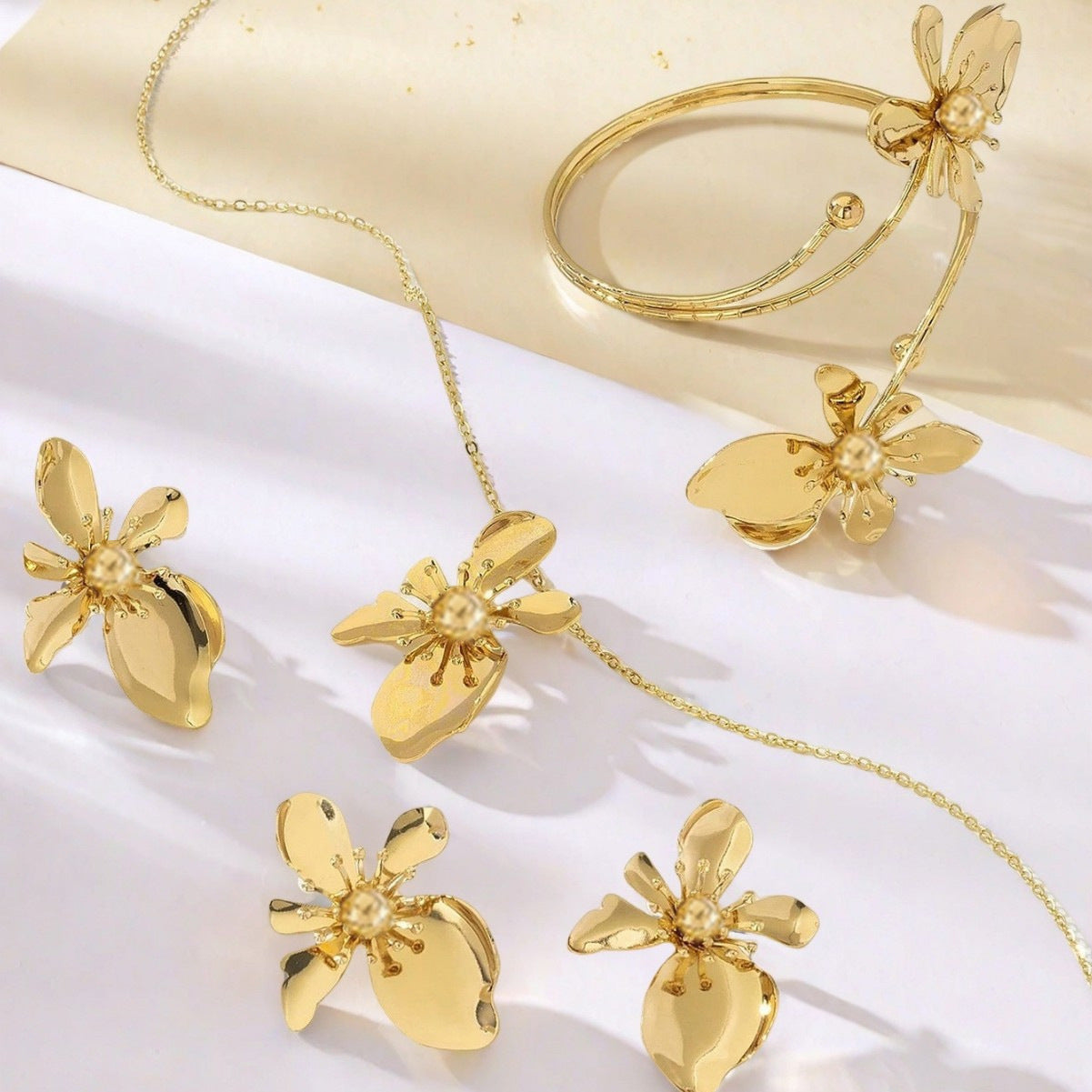 Golden Jewelry Set Featuring Flower Patterns Made Of Durable Metal