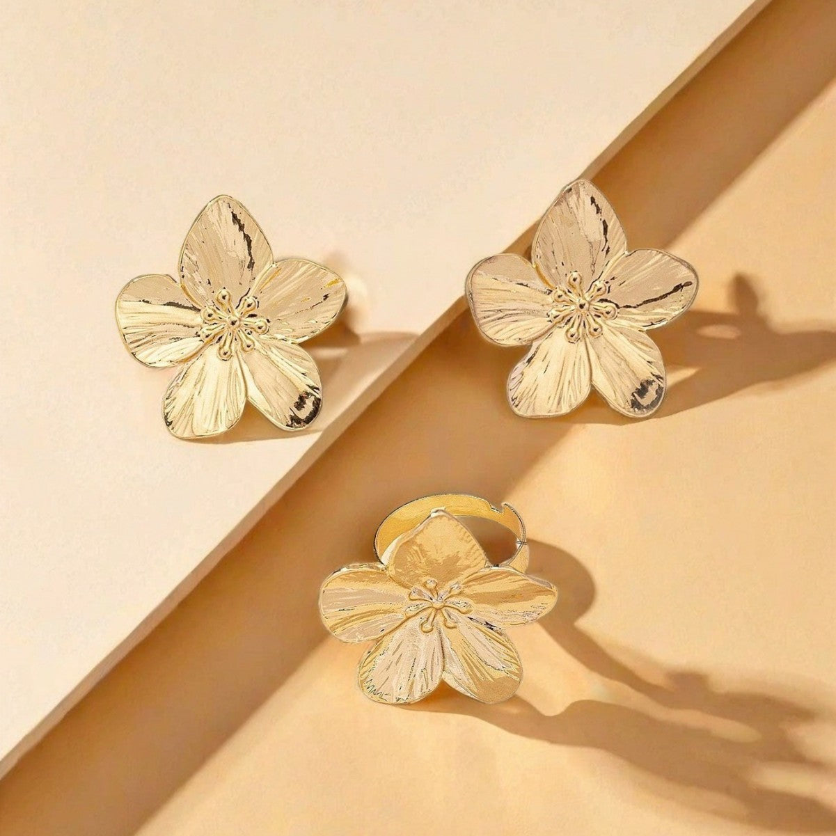Golden Jewelry Set Featuring Flower Pattern Made Of Metal