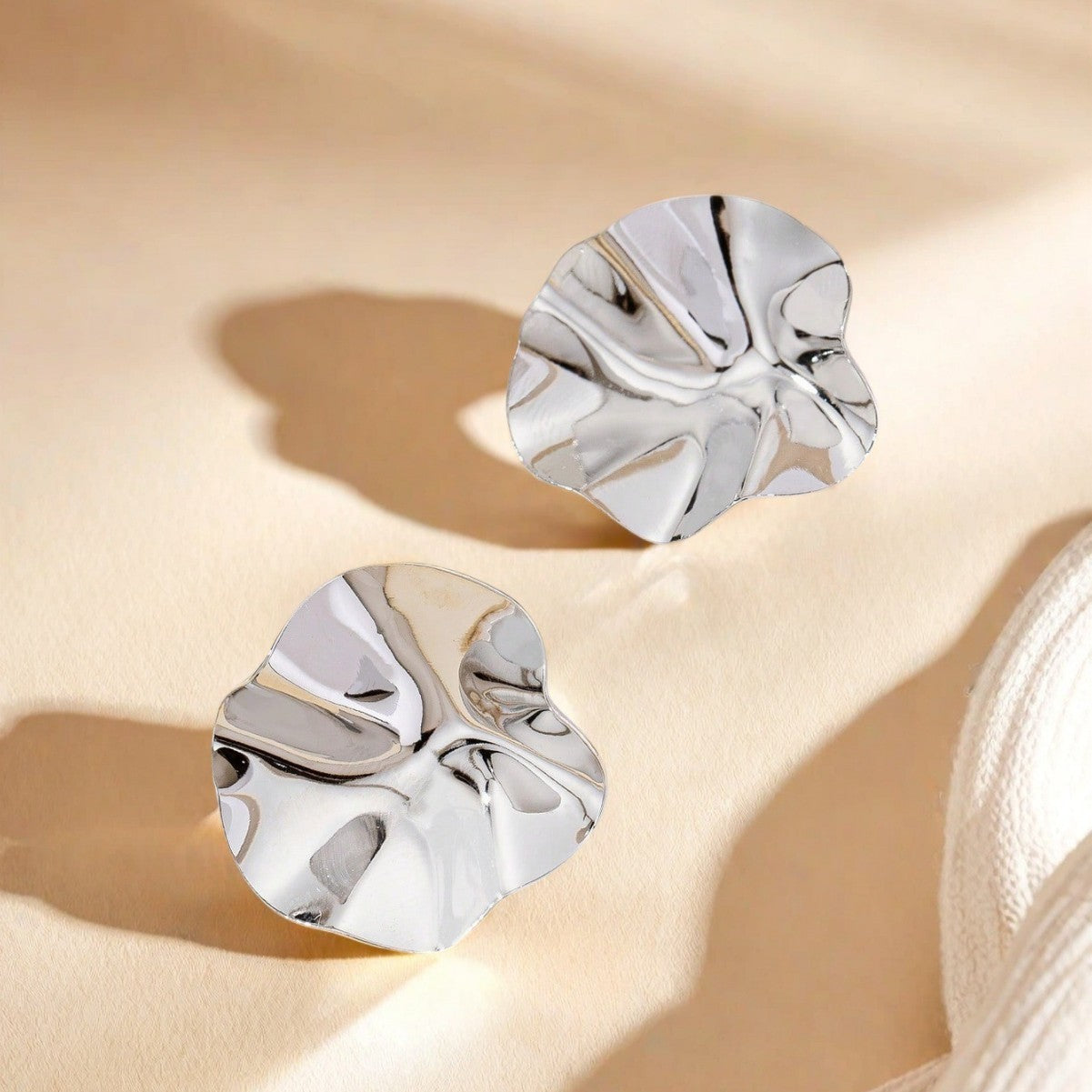 Golden Metal Folds Stud Earrings For Women Featuring Elegant Design