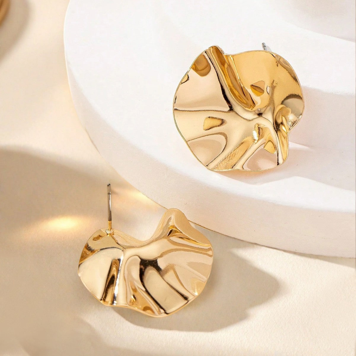 Golden Metal Folds Stud Earrings For Women Featuring Elegant Design