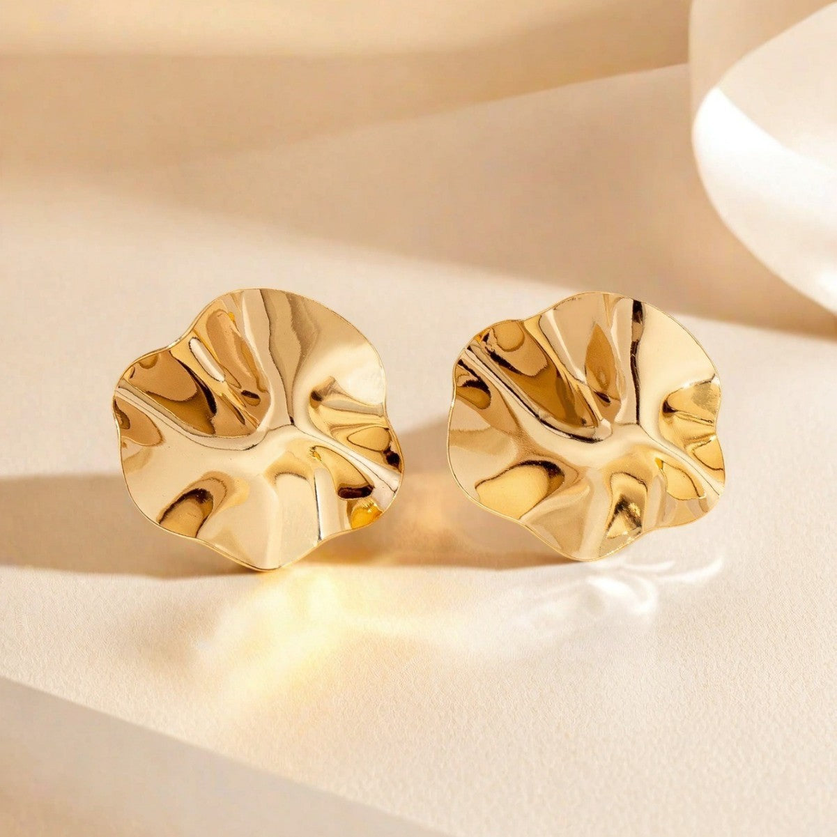 Golden Metal Folds Stud Earrings For Women Featuring Elegant Design