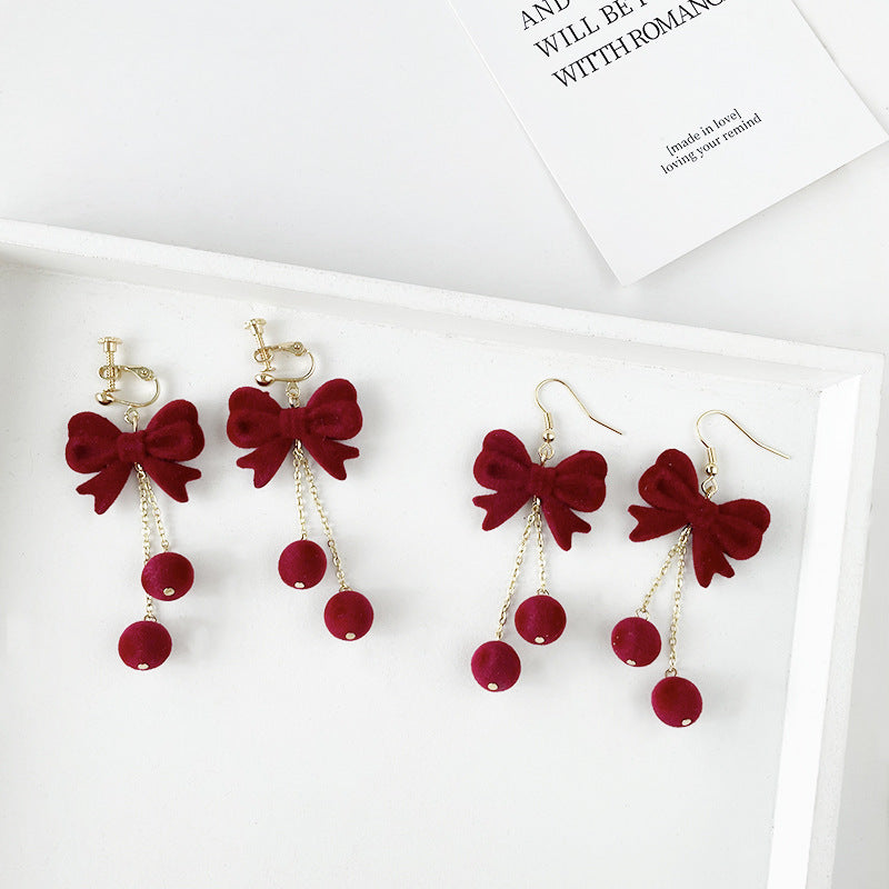 Red Flocking Bow Tie Ear Hook Earrings For New Year