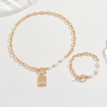 Golden Jewelry Set Featuring Portrait Design With OT Toggle Clasp For Elegant Wear