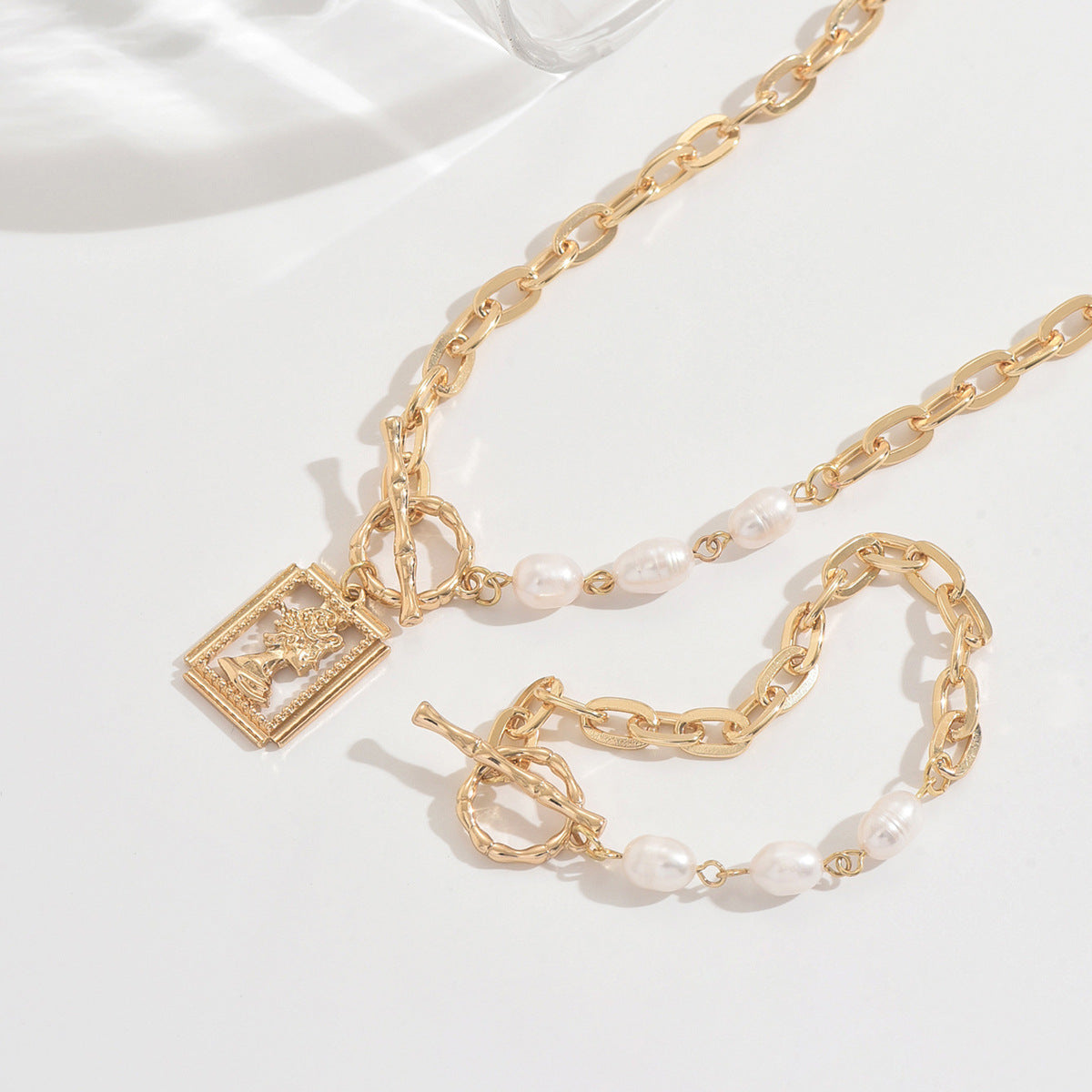 Golden Jewelry Set Featuring Portrait Design With OT Toggle Clasp For Elegant Wear