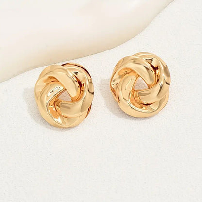 Golden Alloy Twist Stud Earrings For Women Featuring Elegant Craftsmanship