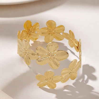 Elegant Golden Flowers Arm Cuff For Women Featuring Electroplated Metal Bangle Jewelry Accessory